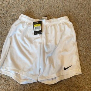 White Nike shorts